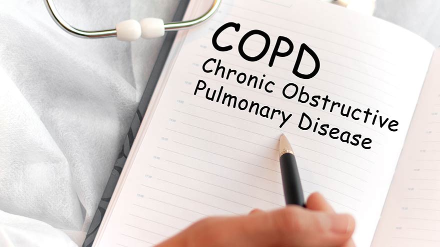 Doctor holding a card with text COPD Chronic Obstructive Pulmonary Disease