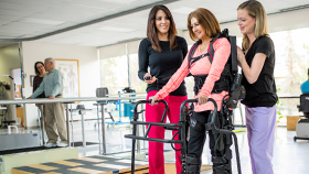 Physical rehabilitation nurses assisting physicatry patient