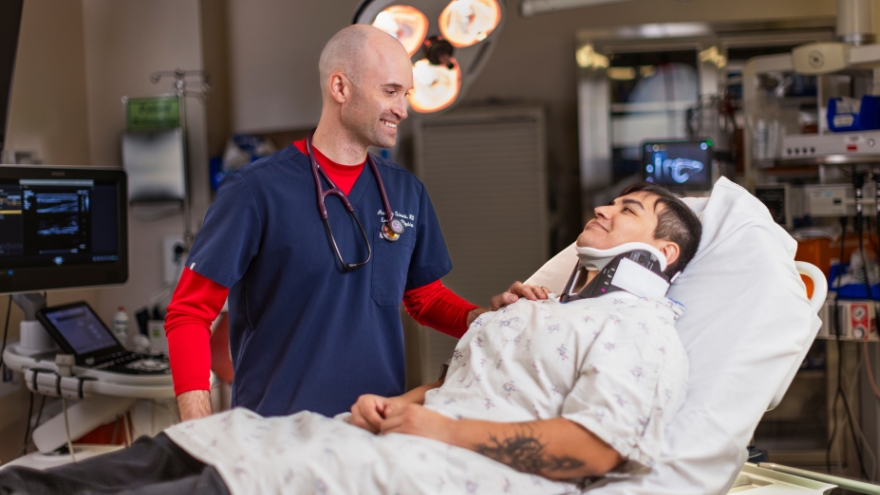 Renown ER doctor taking care of patient in the emergency room